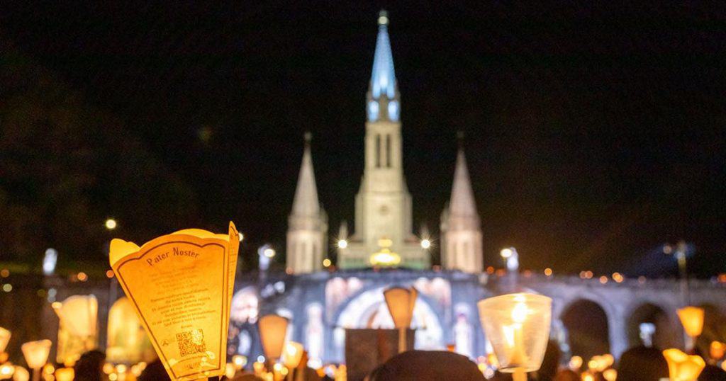 candles lourdes france pater pilgrimage tour catholic journeys
