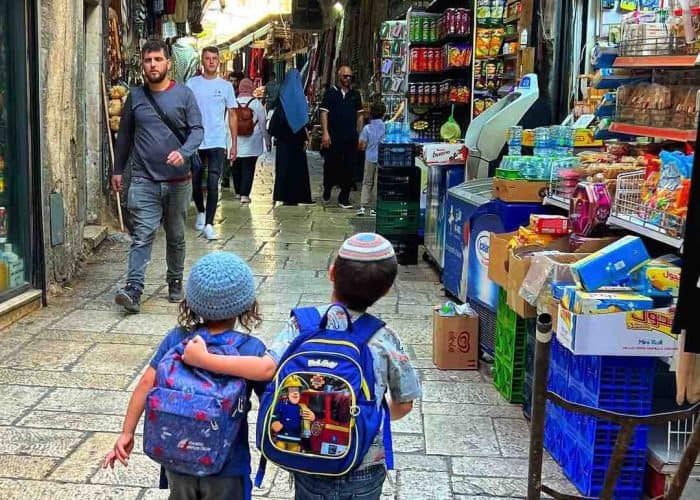 boy in the old city market jerusalem holy land pilgrimage tour