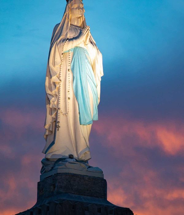 Our Lady of Lourdes at dusk pilgrimage tour