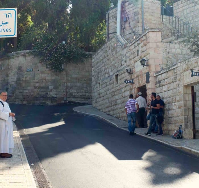 mount of olives sign with restrepo pilgrimage tour holy land